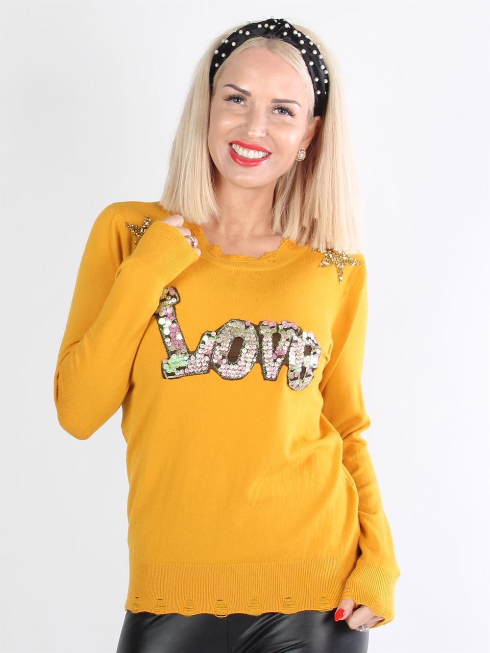 Kelvina - Beige blus med text och stjärnor av paljetter och stenimitationer